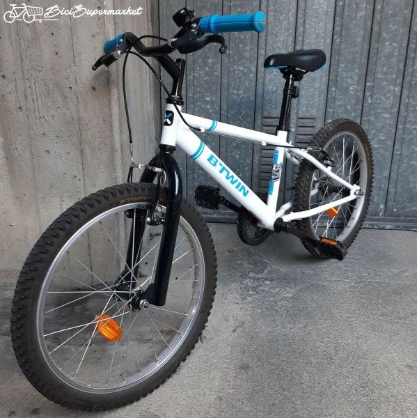 bicicletta b'twin arancione